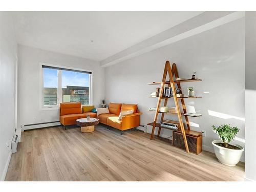 311-238 Sage Valley Common Nw, Calgary, AB - Indoor Photo Showing Living Room