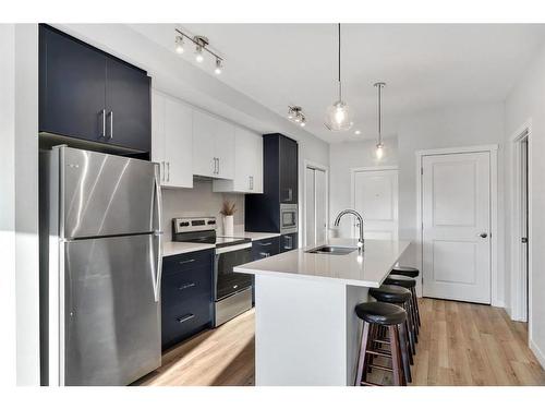 311-238 Sage Valley Common Nw, Calgary, AB - Indoor Photo Showing Kitchen With Stainless Steel Kitchen With Upgraded Kitchen