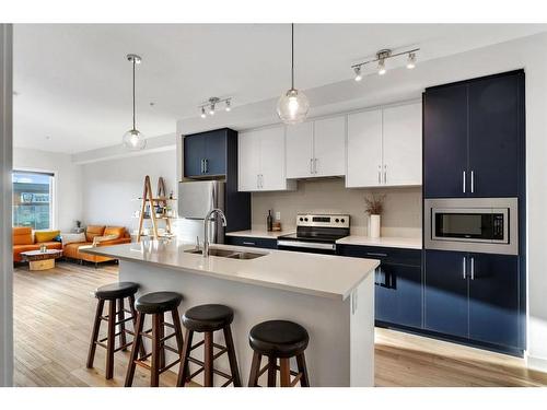 311-238 Sage Valley Common Nw, Calgary, AB - Indoor Photo Showing Kitchen With Stainless Steel Kitchen With Double Sink With Upgraded Kitchen