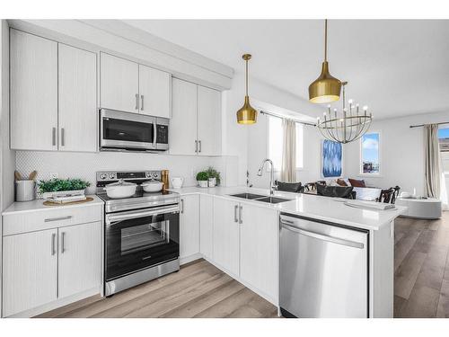 3 Cornerstone Row Ne, Calgary, AB - Indoor Photo Showing Kitchen With Double Sink