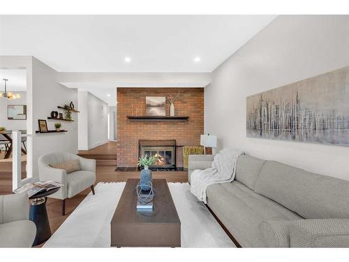 44-1901 Varsity Estates Drive Nw, Calgary, AB - Indoor Photo Showing Living Room With Fireplace