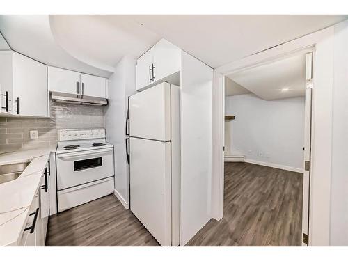 28 Bedford Circle Ne, Calgary, AB - Indoor Photo Showing Kitchen With Double Sink