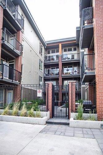 224-305 18 Avenue Sw, Calgary, AB - Outdoor With Balcony With Facade