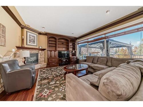 115 Westridge Crescent Sw, Calgary, AB - Indoor Photo Showing Living Room With Fireplace