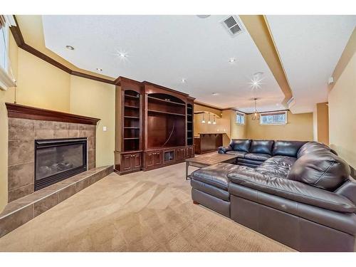 115 Westridge Crescent Sw, Calgary, AB - Indoor Photo Showing Living Room With Fireplace