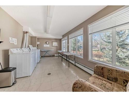 109-550 Prominence Rise Sw, Calgary, AB - Indoor Photo Showing Laundry Room