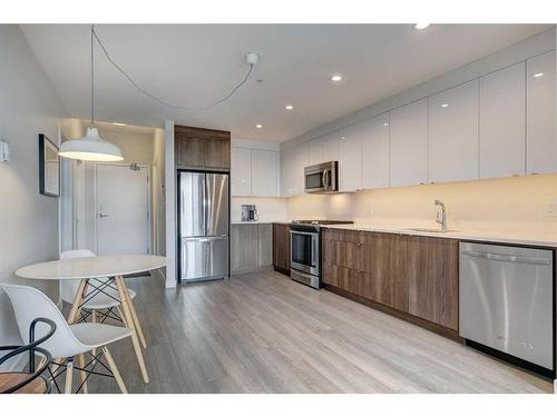 301-1526 9 Avenue Se, Calgary, AB - Indoor Photo Showing Kitchen With Stainless Steel Kitchen