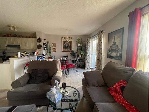 117 Taravista Way Ne, Calgary, AB - Indoor Photo Showing Living Room