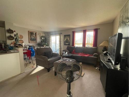 117 Taravista Way Ne, Calgary, AB - Indoor Photo Showing Living Room