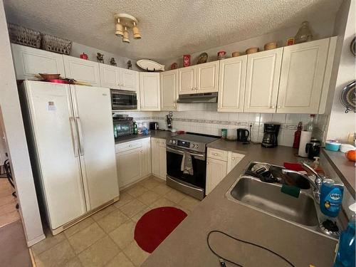 117 Taravista Way Ne, Calgary, AB - Indoor Photo Showing Kitchen