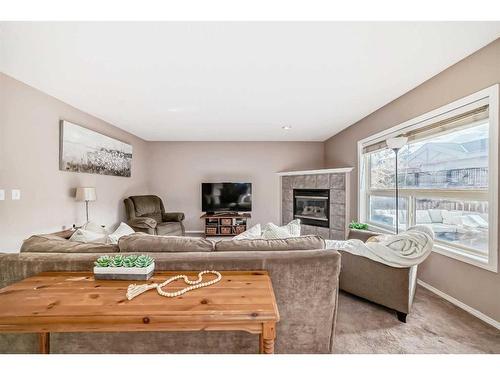 70 Chapala Grove Se, Calgary, AB - Indoor Photo Showing Living Room With Fireplace