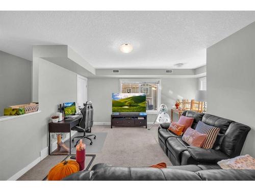 245-300 Marina Drive East, Chestermere, AB - Indoor Photo Showing Living Room