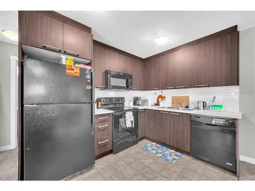 245-300 Marina Drive East, Chestermere, AB - Indoor Photo Showing Kitchen