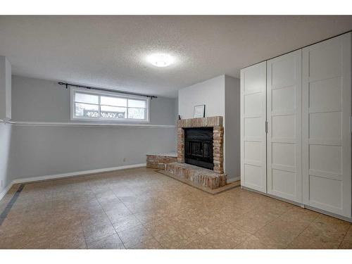 8416 7 Street Sw, Calgary, AB - Indoor With Fireplace