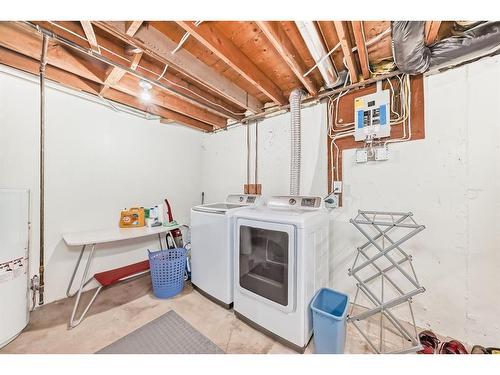 312-9930 Bonaventure Drive Se, Calgary, AB - Indoor Photo Showing Laundry Room