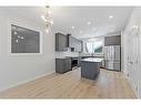 83 Sugarsnap Avenue Se, Calgary, AB  - Indoor Photo Showing Kitchen With Stainless Steel Kitchen With Upgraded Kitchen 