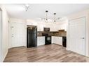 3208-279 Copperpond Common Se, Calgary, AB  - Indoor Photo Showing Kitchen 