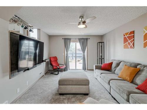 73 Applemont Place Se, Calgary, AB - Indoor Photo Showing Living Room