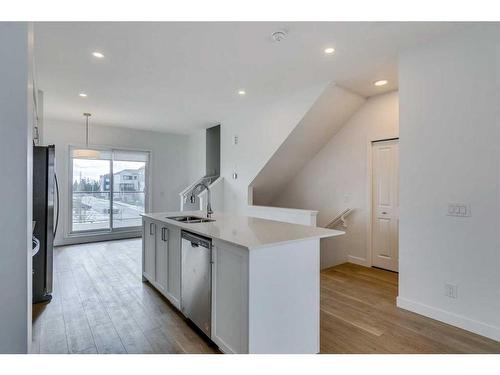 8542 19 Avenue Se, Calgary, AB - Indoor Photo Showing Kitchen With Double Sink