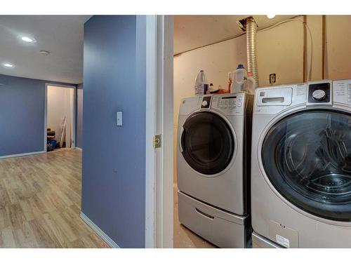 238 Woodmont Court Sw, Calgary, AB - Indoor Photo Showing Laundry Room