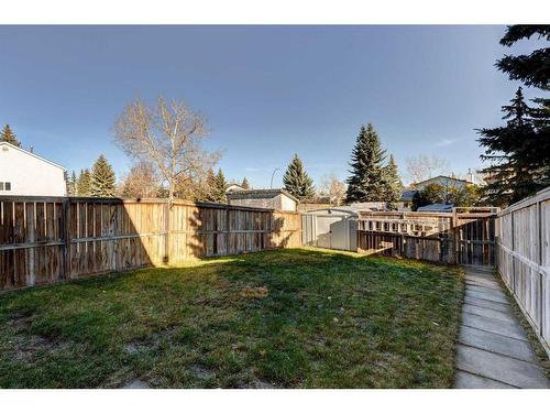 238 Woodmont Court Sw, Calgary, AB - Outdoor With Backyard