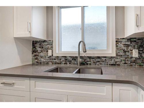 238 Woodmont Court Sw, Calgary, AB - Indoor Photo Showing Kitchen With Double Sink