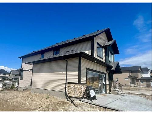 2 Heritage Close, Cochrane, AB - Outdoor With Exterior