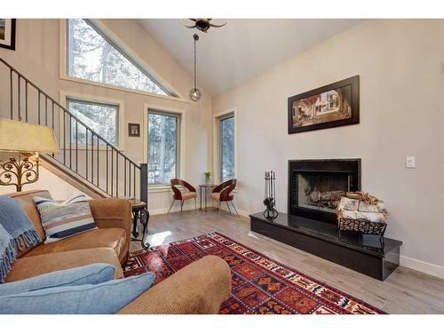 136-5417 Highway 579, Rural Mountain View County, AB - Indoor Photo Showing Living Room With Fireplace