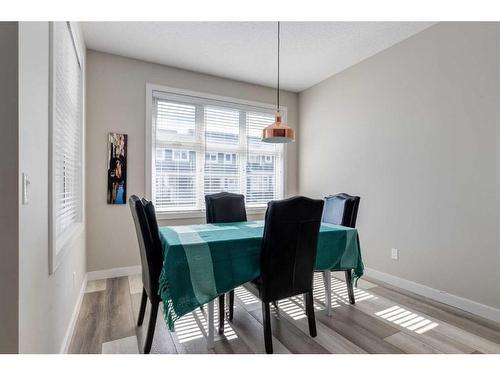 295 Silverado Plains Park Sw, Calgary, AB - Indoor Photo Showing Dining Room