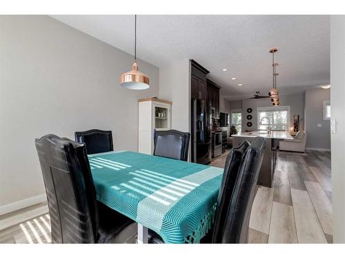 295 Silverado Plains Park Sw, Calgary, AB - Indoor Photo Showing Dining Room