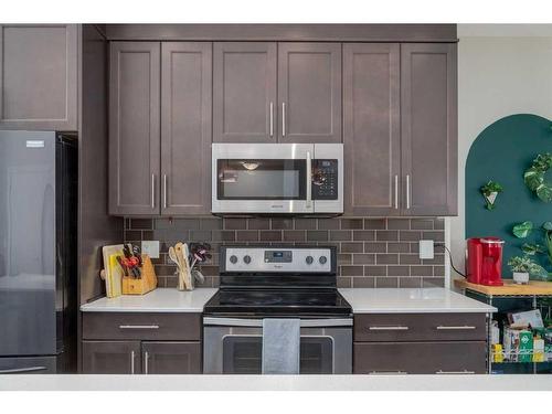 295 Silverado Plains Park Sw, Calgary, AB - Indoor Photo Showing Kitchen