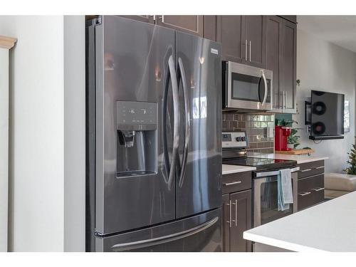 295 Silverado Plains Park Sw, Calgary, AB - Indoor Photo Showing Kitchen With Stainless Steel Kitchen With Upgraded Kitchen