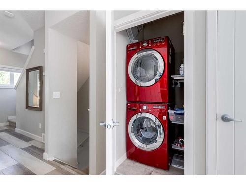 295 Silverado Plains Park Sw, Calgary, AB - Indoor Photo Showing Laundry Room