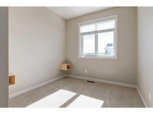 295 Silverado Plains Park Sw, Calgary, AB - Indoor Photo Showing Other Room