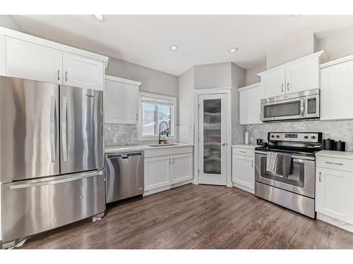 2668 Kings Heights Gate Se, Airdrie, AB - Indoor Photo Showing Kitchen With Stainless Steel Kitchen With Upgraded Kitchen