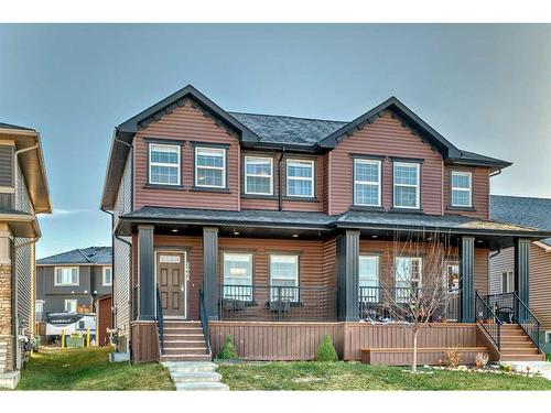 2668 Kings Heights Gate Se, Airdrie, AB - Outdoor With Deck Patio Veranda With Facade