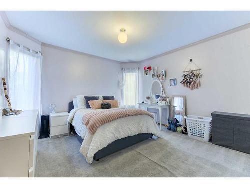 79 Laguna Circle Ne, Calgary, AB - Indoor Photo Showing Bedroom