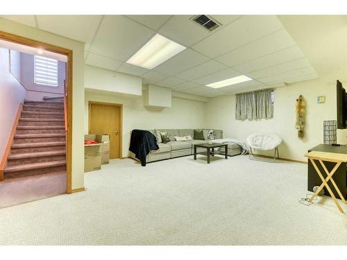 79 Laguna Circle Ne, Calgary, AB - Indoor Photo Showing Basement