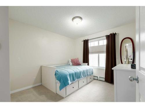 204-369 Rocky Vista Park Nw, Calgary, AB - Indoor Photo Showing Bedroom