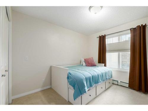 204-369 Rocky Vista Park Nw, Calgary, AB - Indoor Photo Showing Bedroom