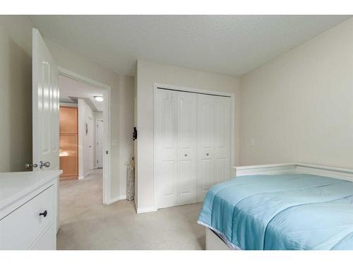 204-369 Rocky Vista Park Nw, Calgary, AB - Indoor Photo Showing Bedroom