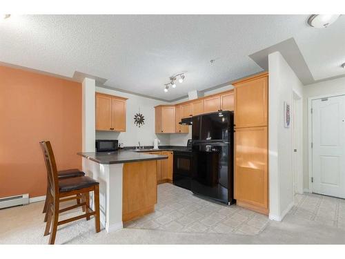 204-369 Rocky Vista Park Nw, Calgary, AB - Indoor Photo Showing Kitchen