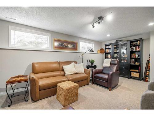 732 Lake Bonavista Drive Se, Calgary, AB - Indoor Photo Showing Living Room