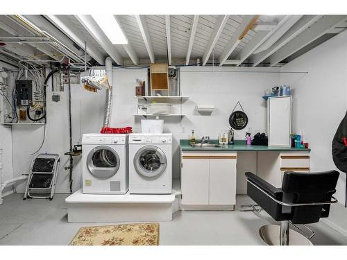 732 Lake Bonavista Drive Se, Calgary, AB - Indoor Photo Showing Laundry Room