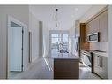 2508-395 Skyview Parkway Ne, Calgary, AB  - Indoor Photo Showing Kitchen With Double Sink With Upgraded Kitchen 