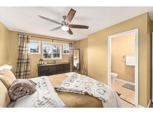 208 Stonemere Place, Chestermere, AB - Indoor Photo Showing Bedroom