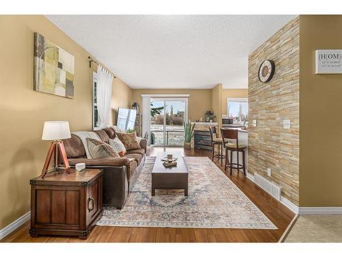 208 Stonemere Place, Chestermere, AB - Indoor Photo Showing Living Room