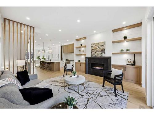 2112 Broadview Road Nw, Calgary, AB - Indoor Photo Showing Living Room With Fireplace