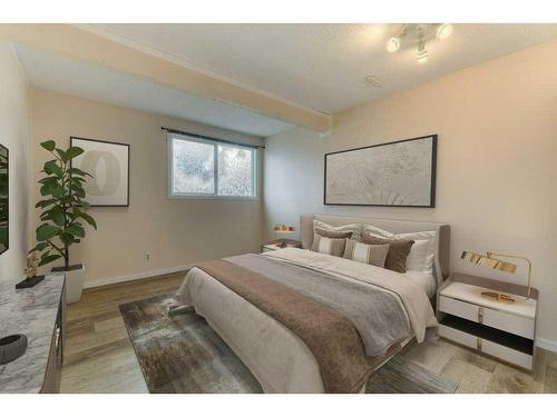 138 Oaktree Lane Sw, Calgary, AB - Indoor Photo Showing Bedroom