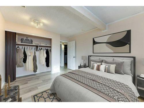 138 Oaktree Lane Sw, Calgary, AB - Indoor Photo Showing Bedroom